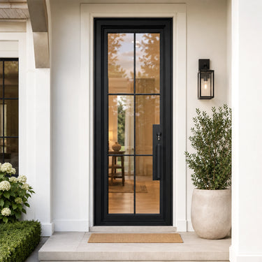 Modern black door with glass panels on a white house exterior.