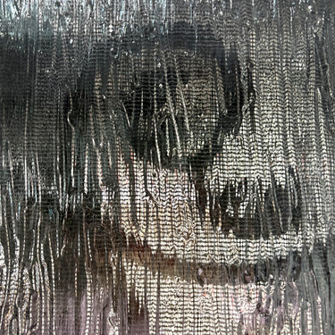 Custom wrought iron screen door with rainstorm glass