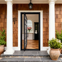 Energy efficient black steel entry door with glass grid panels and pivot opening system