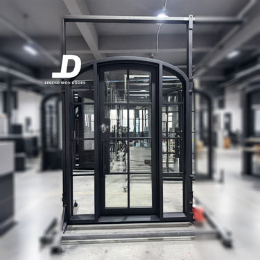 Arched top French iron single door with eight lite glass design