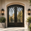 Arch iron glass front double door with scrollwork and kickplate
