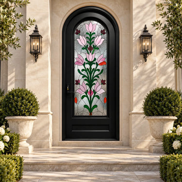 Round top black iron front door with pink floral Tiffany-style stained glass