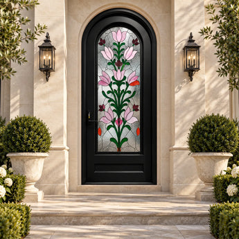 Round top black iron front door with pink floral Tiffany-style stained glass