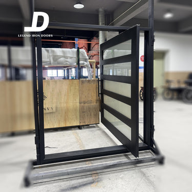Handmade-wrought-iron-pivot-door-with-frosted-glass