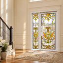 Art Nouveau stained glass iron front door with matching sidelight and amber floral patterns