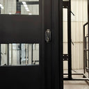 Contemporary Pivot Front Door with smart lock